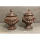 A pair of Italianate style terracotta pots