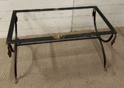 A wrought iron coffee table with swan neck end supports terminating in web feet (H43cm W83cm D42cm0