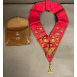 A Masonic sash in case featuring the rose Croix jewel medal