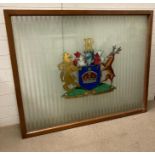 A framed glass coat of arms (140cm x 111cm)