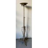 An early 20th century oil standard lamp in brass, converted to a lamp stand