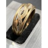 A 9ct gold and diamond ring (Approximate Total Weight 3.8g)