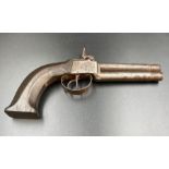 An Antique double barrelled flintlock pistol