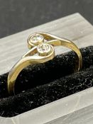 An 18ct gold two diamond stone ring Size J