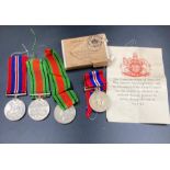 War Medal and Defence Medal, two sets awarded to Mr A W Green