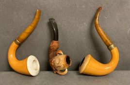 A selection of three vintage pipes