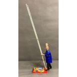 A Gordon Murray puppets Ltd clockwork tin Trumpton Town Fire Brigade ladder climbing fireman made by