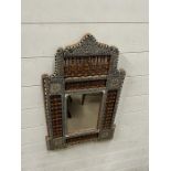 An inlaid mother of pearl Egyptian style wall mirror (41cm x 65cm)