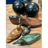 A selection of wooden decorative items to include ducks, shoe last and bowling balls