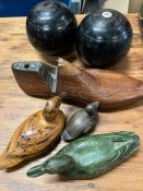 A selection of wooden decorative items to include ducks, shoe last and bowling balls