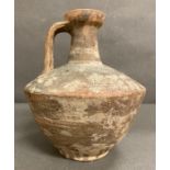 A Roman Terracotta Flagon