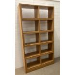 A light oak room divider/bookcase (open back) (W103cm D30cm H195cm)