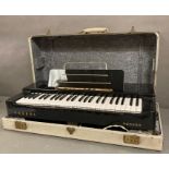 A cased Hohner organa organ