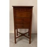 A mahogany three drawer side table with lift up lid (H72cm W34cm D34cm)
