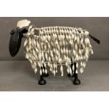 A Kreatif Kraft metal ornamental garden sheep