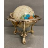 A Nautica world globe with compass set