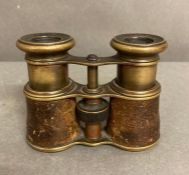 A Pair of leather covered antique French Opera glasses,