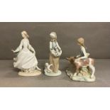 A selection of three Lladro figurines