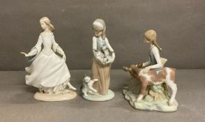 A selection of three Lladro figurines