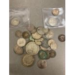 A quantity of circulated silver coins, including British pre 1947 Florins, shillings etc and some