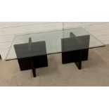 Natuzzi Italia glass table with cross design supports