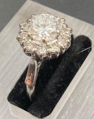 A vintage diamond daisy or cluster ring in a platinum setting, main diamond approx 1.95ct J/K colour