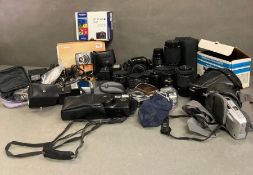 A large selection of cameras and photographic equipment