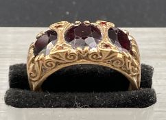 A 9ct gold three stone ring (Approximate weight 4.2g)