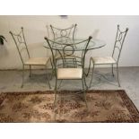 A wrought iron glass topped dining table in green (H74cm Dia117cm)