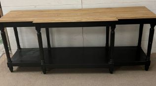 A console table with painted reeded leg support (H80cm W200cm D50cm)