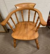 A smokers bow captain elbow chair