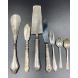 A selection of various silver items to include teaspoons, silver handled knife, shoehorn etc.