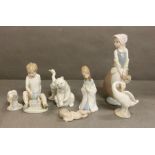 A selection of Nao and Lladro figures and animals