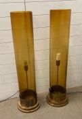 Two Mid Century floor lamps with amber shades and chrome bases 103 cm High by 19.5cm Diameter
