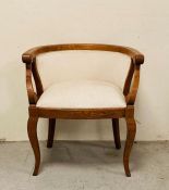 A curved back hall chair (H77cm W72cm)