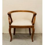 A curved back hall chair (H77cm W72cm)