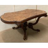 A Victorian figured bur walnut centre table