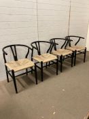 A set of four black painted Lom Bok Mid Century dining chairs