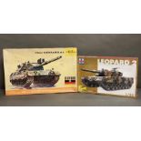 Three boxed model tank kits, Tiger Elefant, Heller Char Leopard A4 and Leopard 2