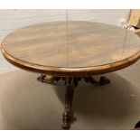 A mahogany pedestal tilt top dining table with renaissance revival style feet AF