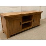 A light oak side unit with cupboards to side (H60cm W147cm D43cm)