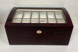 A Large 24 watch collectors box, with two pull out trays, glass top and key.