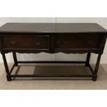 An oak dresser base with shape skirt (H79cm W140cm D42cm)