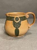 A rare Lambeth Doulton Maori Art Stoneware jug