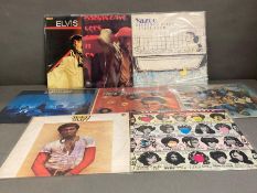 A selection of eight 70's and 80's LP including, Elvis, Yazoo, Jimmy Clift, Genesis and The