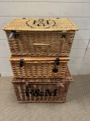 Three wicker hampers, one stamped Fortnum and Mason and one stamped Holland Park