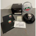 A Tag Heuer professional stainless steel watch with paper and box (34mm face)