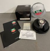 A Tag Heuer professional stainless steel watch with paper and box (34mm face)