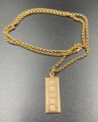 A 9ct gold ingot on a 9ct gold chain (Approximate Weight 7.9g)