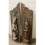 A pair of Javanese carved door panels with painted figures and carving. 142 cm High by 35 cm wide